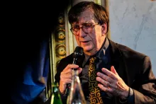 image of Bruno Latour speaking into a microphone