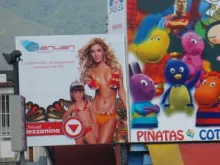 A toy store ad with an adult and child models. 