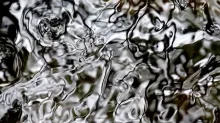 abstract black and white image resembling flowing water
